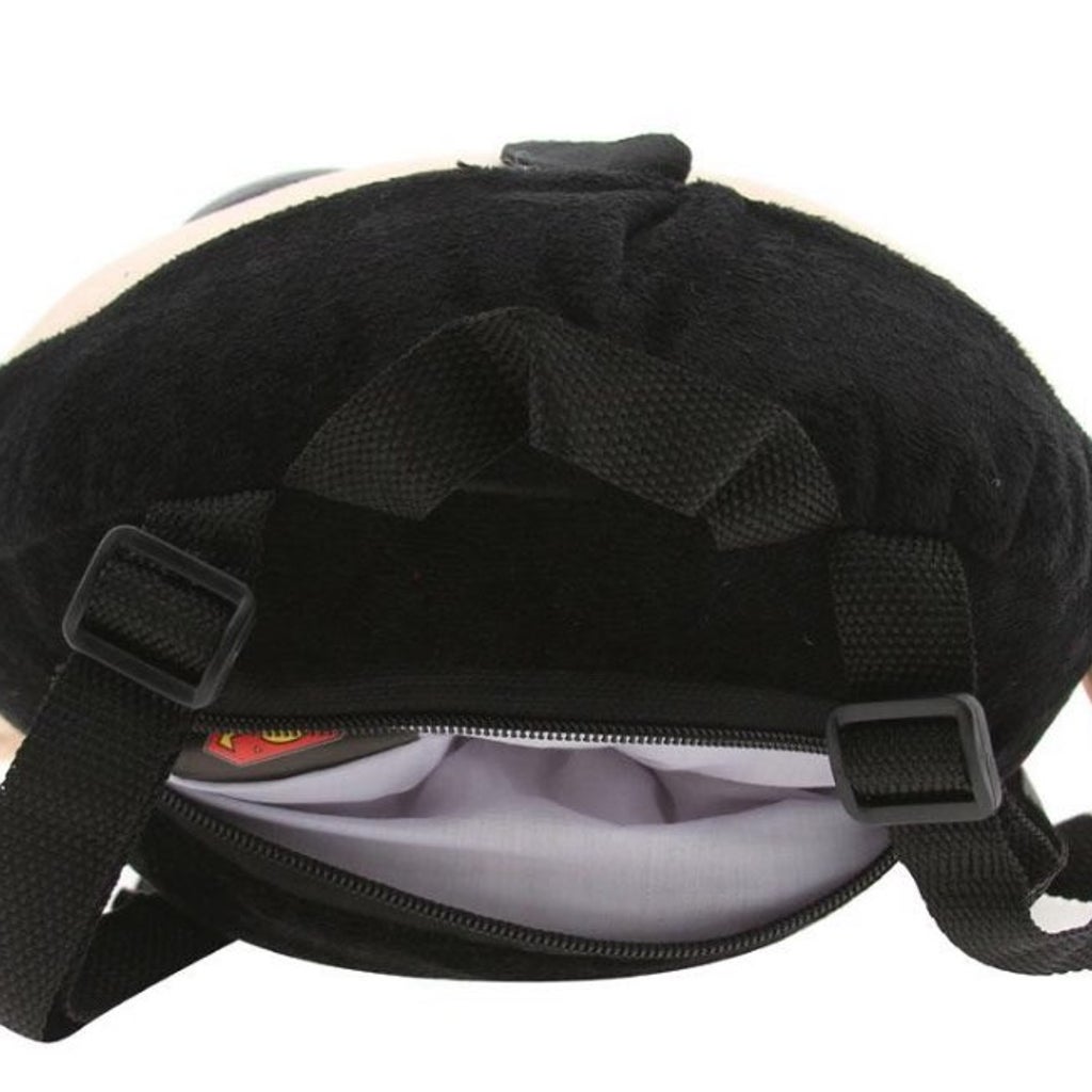 Zippered compartment inside plush head

